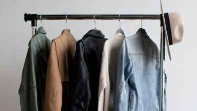 five jackets on clothes rack