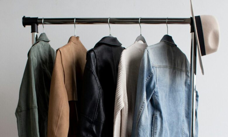 five jackets on clothes rack